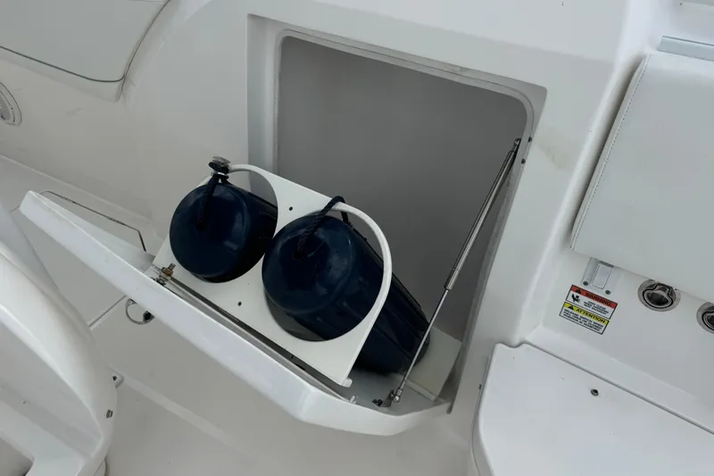  Yacht Photos Pics Storage compartment with fenders on a 2019 Intrepid 345 Nomad FE boat.