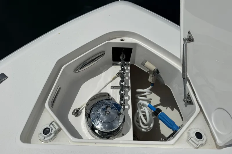  Yacht Photos Pics Anchor locker of 2019 Intrepid 345 Nomad FE boat with chain and hose storage.
