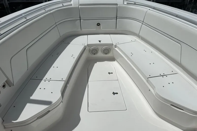  Yacht Photos Pics 2019 Intrepid 345 Nomad FE boat interior with spacious seating and storage compartments.