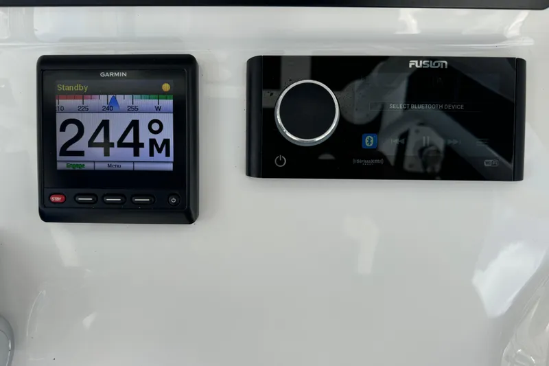  Yacht Photos Pics Garmin and Fusion displays on 2019 Intrepid 345 Nomad FE boat dashboard.