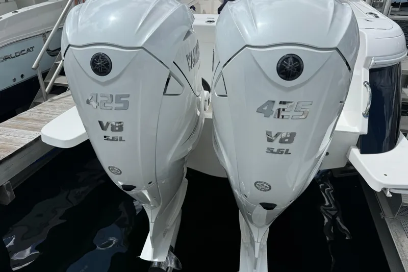  Yacht Photos Pics Twin Yamaha 425 V8 engines on a 2019 Intrepid 345 Nomad FE boat at dock.