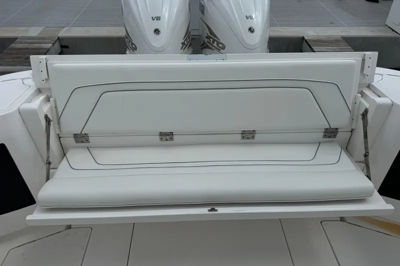  Yacht Photos Pics 2019 Intrepid 345 Nomad FE boat with white foldable bench seat and dual V8 engines.