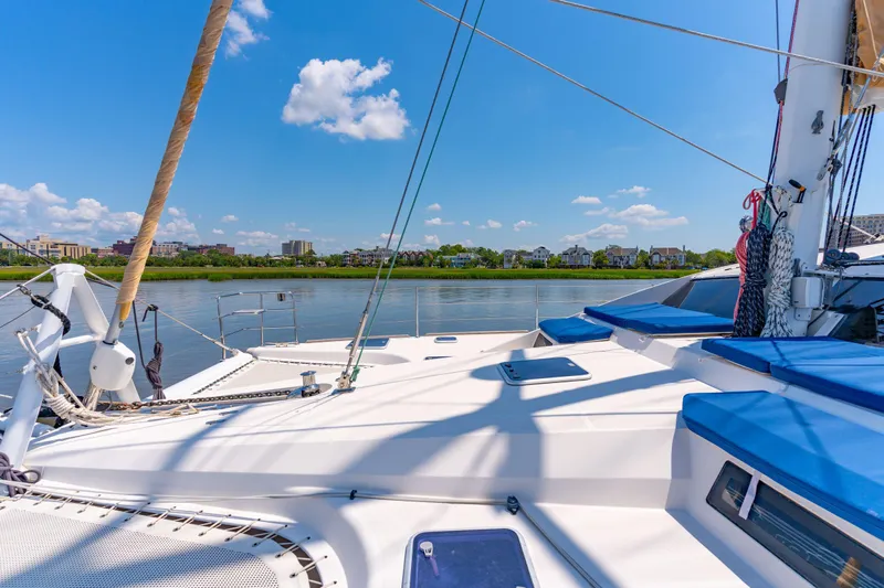 La Cura Yacht Photos Pics Luxury Privilege Series 5 yacht on serene water, 2015 model, under clear blue sky.