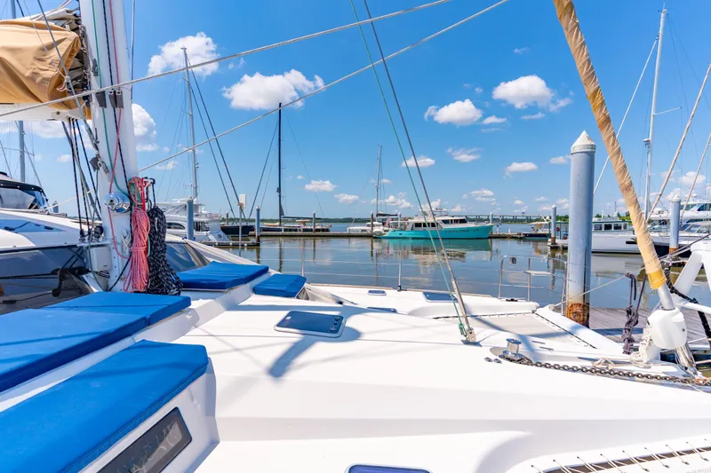 La Cura Yacht Photos Pics Privilege Series 5 catamaran docked at marina, clear blue sky, 2015 model.