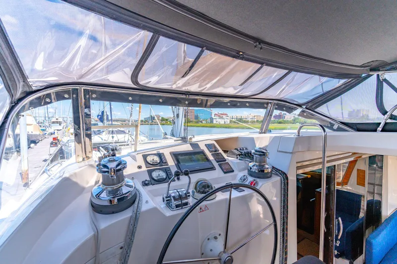 La Cura Yacht Photos Pics Interior view of 2015 Privilege Series 5 yacht cockpit with navigation equipment.
