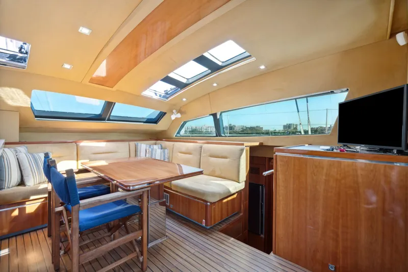 La Cura Yacht Photos Pics Luxurious 2015 Privilege Series 5 yacht interior with skylights and elegant seating.