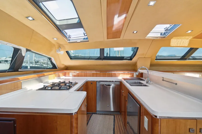 La Cura Yacht Photos Pics Luxurious 2015 Privilege Series 5 yacht kitchen with modern appliances and sleek design.