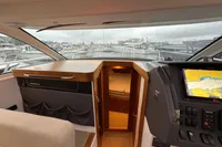 Interior view of 2019 Nimbus 365 Coupe' yacht with navigation system and cabin entrance.