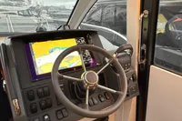 Steering wheel and navigation system of 2019 Nimbus 365 Coupe boat.