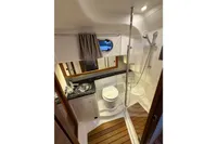 Luxurious bathroom in 2019 Nimbus 365 Coupe yacht with shower and modern fixtures.