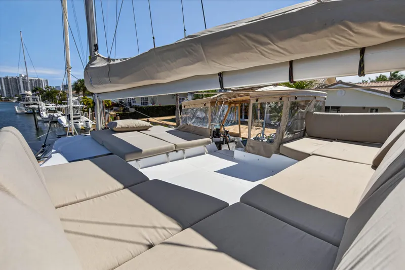 Lucky Dog Yacht Photos Pics 2022 Fountaine Pajot Tanna 47 yacht with spacious deck and comfortable seating.