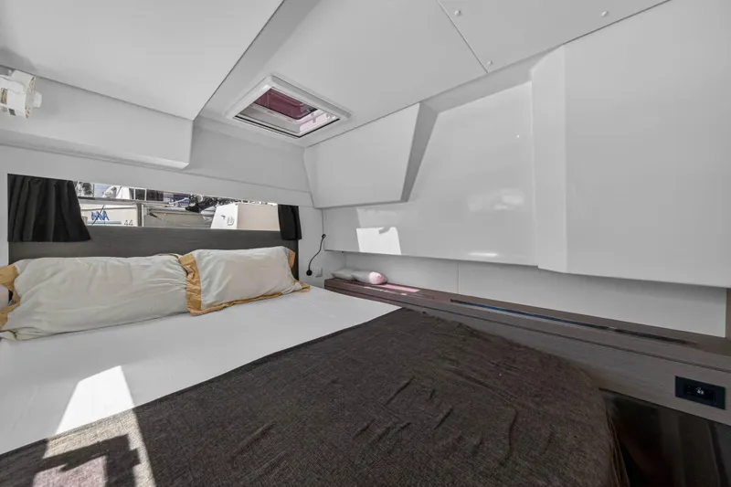 Lucky Dog Yacht Photos Pics Luxurious cabin interior of 2022 Fountaine Pajot Tanna 47 yacht with modern design.