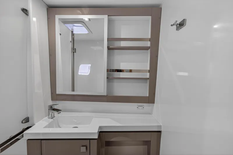 Lucky Dog Yacht Photos Pics Modern bathroom interior of 2022 Fountaine Pajot Tanna 47 yacht.