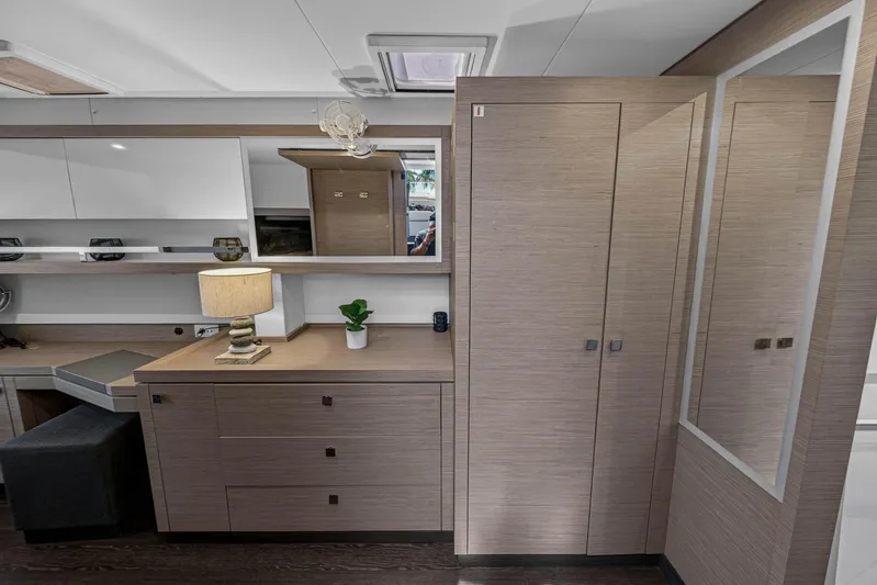 Lucky Dog Yacht Photos Pics 2022 Fountaine Pajot Tanna 47 interior with modern cabinetry and elegant decor.