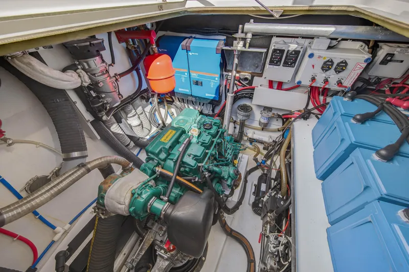 Lucky Dog Yacht Photos Pics Engine room of 2022 Fountaine Pajot Tanna 47 catamaran, showcasing mechanical and electrical systems.