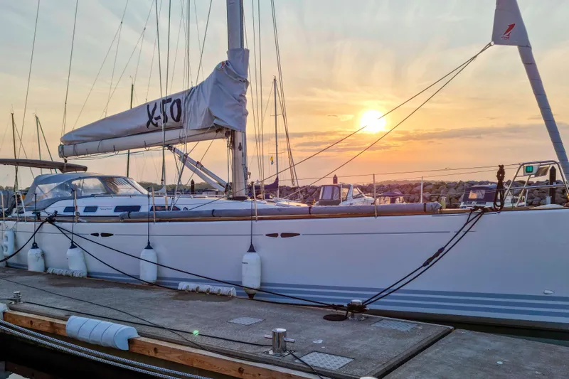  Yacht Photos Pics 2008 X-Yachts X50 sailboat docked at sunset, showcasing sleek design and elegant lines.
