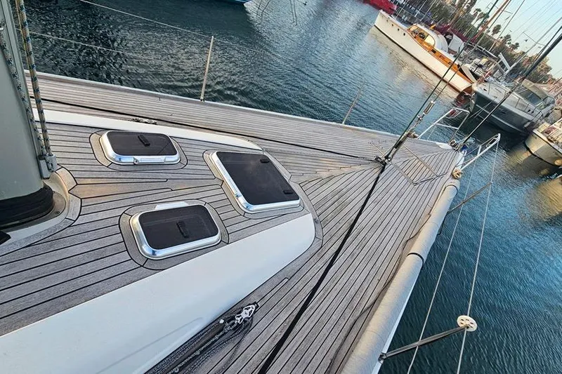  Yacht Photos Pics Deck of 2008 X-Yachts X50 sailboat with sleek design and marina view.