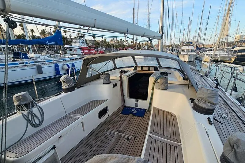  Yacht Photos Pics 2008 X-Yachts X50 sailboat cockpit with teak decking, docked in a marina.