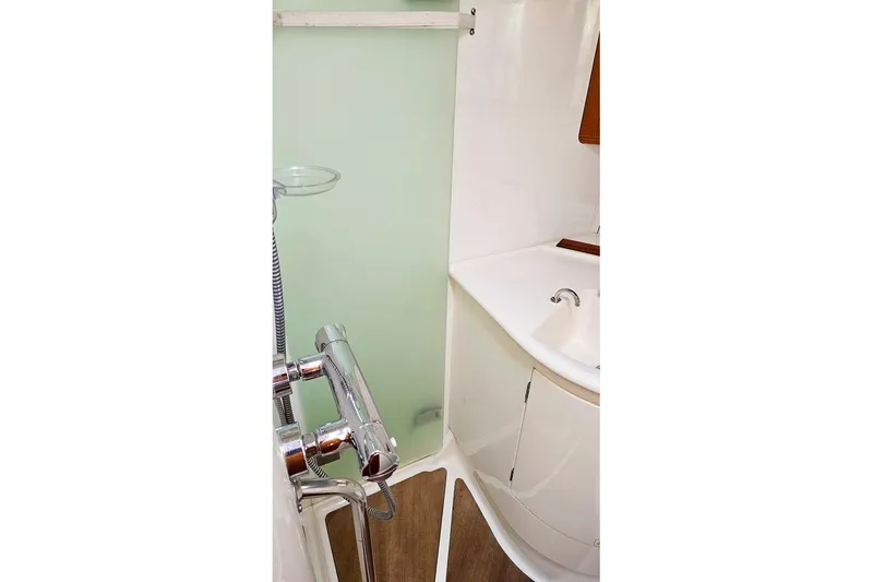  Yacht Photos Pics Bathroom interior of 2008 X-Yachts X50, featuring a modern sink and shower.
