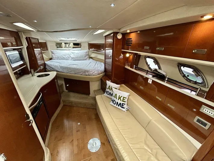  Yacht Photos Pics Interior of 2010 Sea Ray 330 Sundancer yacht with cozy cabin and modern amenities.