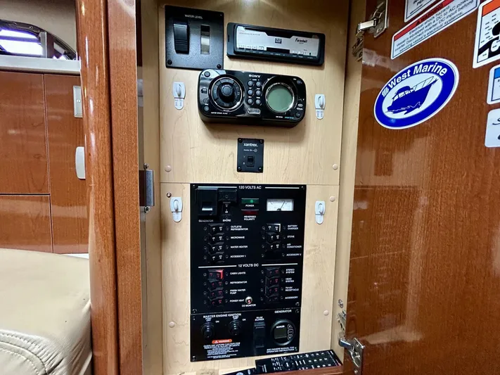  Yacht Photos Pics Electrical control panel inside 2010 Sea Ray 330 Sundancer boat cabin.