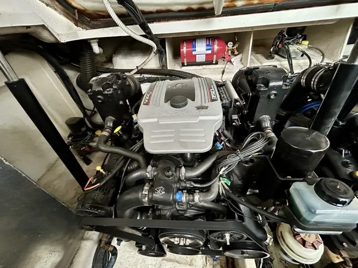  Yacht Photos Pics Engine compartment of a 2010 Sea Ray 330 Sundancer boat, featuring detailed mechanical components.