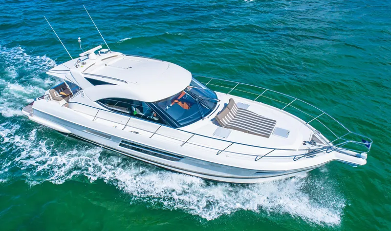 Belle-rosa Yacht Photos Pics 2016 Riviera 5000 Sport Yacht cruising on open sea.