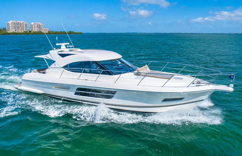 Belle-rosa Yacht Photos Pics 2016 Riviera 5000 Sport Yacht cruising on open water.