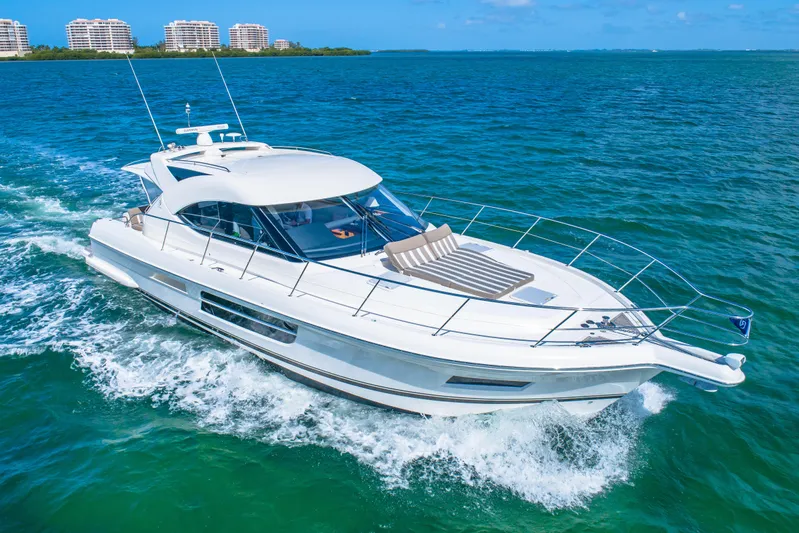 Belle-rosa Yacht Photos Pics 2016 Riviera 5000 Sport Yacht cruising on open sea.