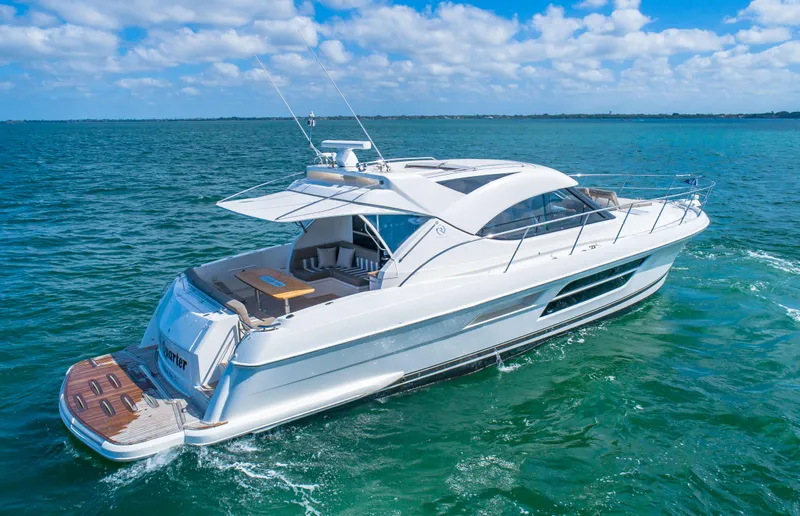 Belle-rosa Yacht Photos Pics 2016 Riviera 5000 Sport Yacht cruising on open sea.