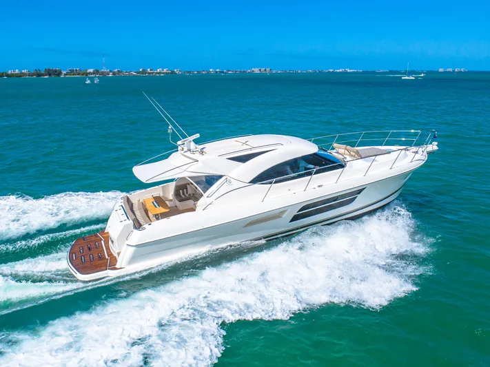 Belle-rosa Yacht Photos Pics 2016 Riviera 5000 Sport Yacht cruising on open sea.