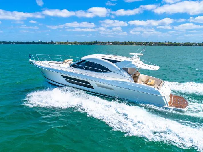 Belle-rosa Yacht Photos Pics Riviera 5000 Sport Yacht 2016 cruising on open water.