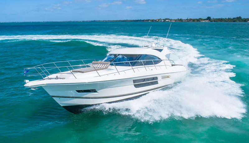 Belle-rosa Yacht Photos Pics 2016 Riviera 5000 Sport Yacht cruising on open sea.