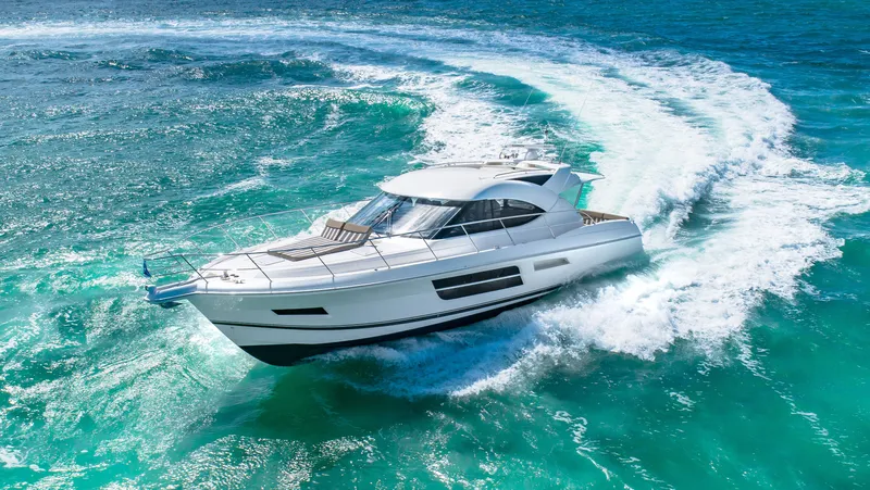 Belle-rosa Yacht Photos Pics 2016 Riviera 5000 Sport Yacht cruising on open sea.