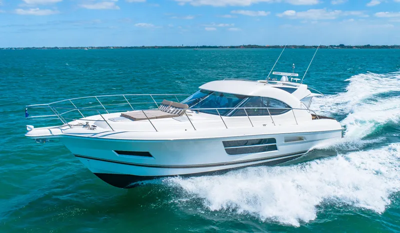 Belle-rosa Yacht Photos Pics 2016 Riviera 5000 Sport Yacht cruising on open sea.