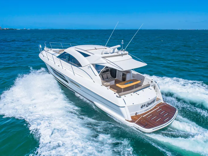 Belle-rosa Yacht Photos Pics 2016 Riviera 5000 Sport Yacht cruising on open sea.