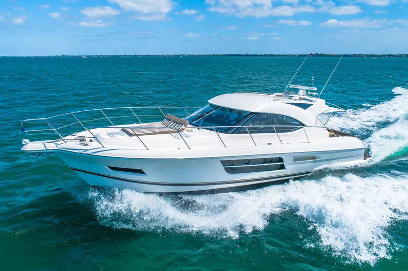 Belle-rosa Yacht Photos Pics 2016 Riviera 5000 Sport Yacht cruising on open water.