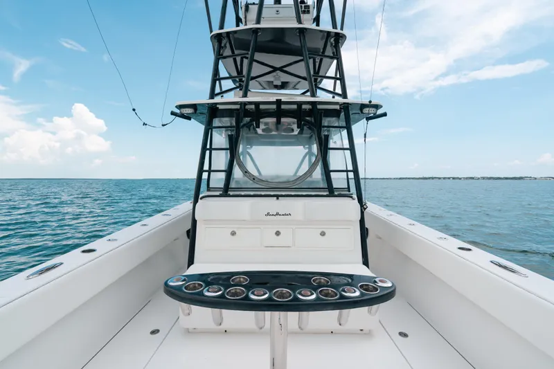  Yacht Photos Pics SeaHunter 45 boat, 2013 model, on open water under a clear blue sky.