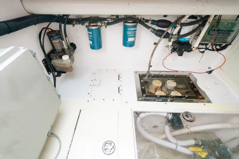  Yacht Photos Pics Engine compartment of a 2013 SeaHunter 45 boat with fuel filters and wiring.