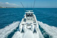 Freeman 42 boat cruising on open sea, 2019 model, with four powerful engines.