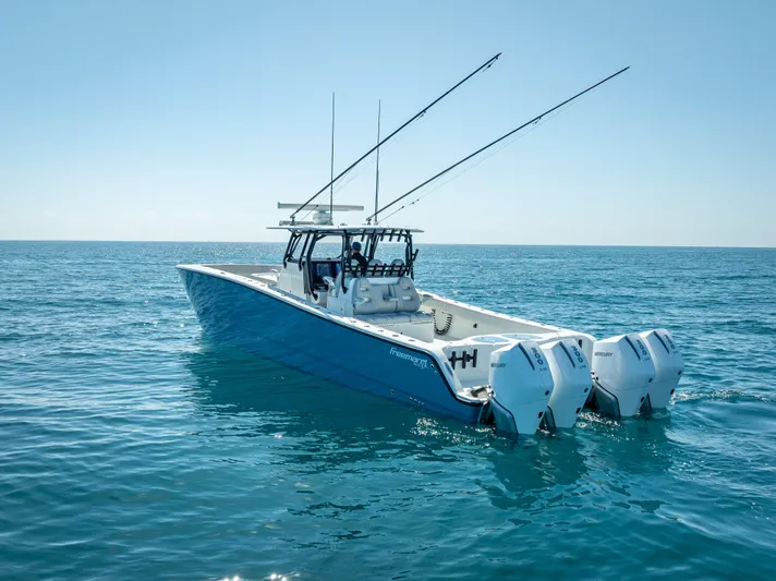 Yacht Photos Pics 2019 Freeman 42 boat with dual engines on open sea.