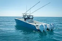 2019 Freeman 42 boat with dual engines on open sea.