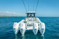 2019 Freeman 42 boat with quad engines on open water.