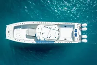 Aerial view of 2019 Freeman 42 boat on clear blue water.