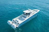 2019 Freeman 42 boat on clear blue ocean water.