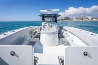 2019 Freeman 42 boat on clear blue ocean near coastline.