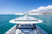Freeman 42 boat with Simrad equipment on clear blue ocean, 2019 model.