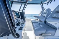 Interior of 2019 Freeman 42 boat with luxurious seating and ocean view.