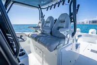 Luxurious seating on a 2019 Freeman 42 boat, with ocean view and modern design.