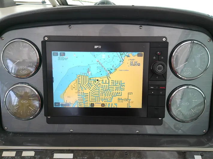 Parrotdise Yacht Photos Pics Dashboard of 2005 Sea Ray 390 Sundancer with navigation system and gauges.